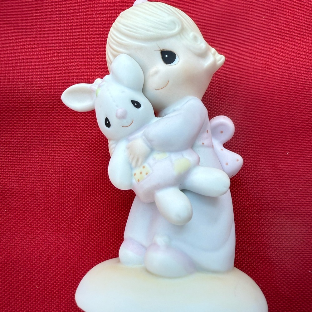 Precious Moments White and Pink Figurine